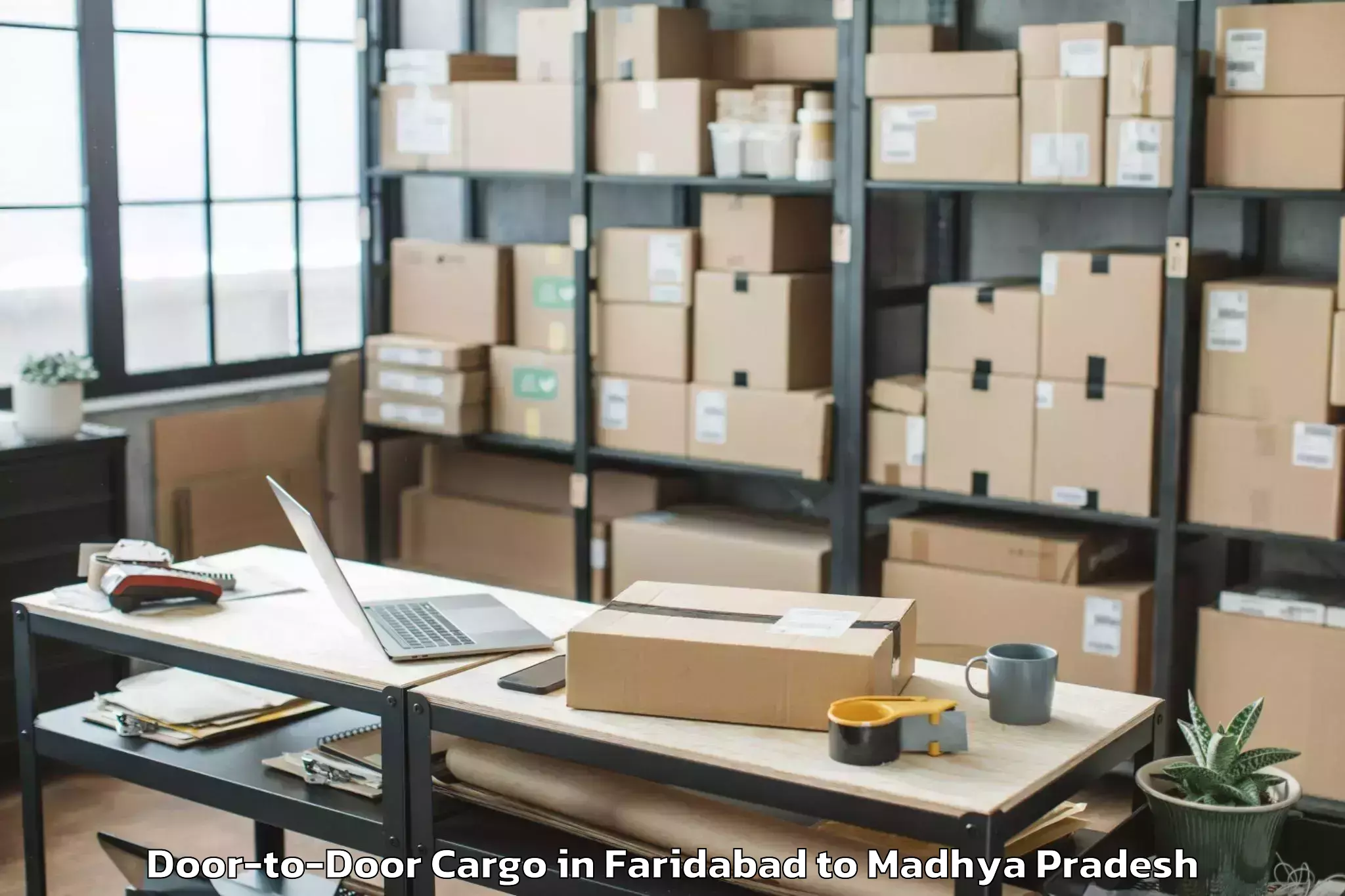 Easy Faridabad to Shivpuri Door To Door Cargo Booking